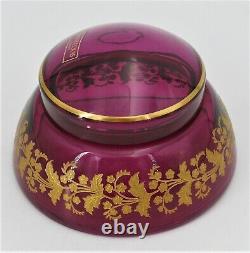 Bonbonnière Saint Louis cristal doublé mauve, dégagé et doré de fleurs, signée