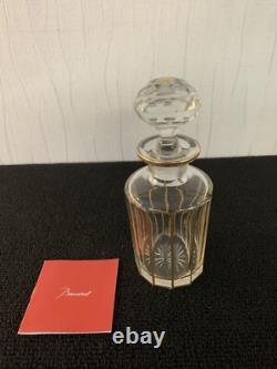 Flacon doré en cristal de Baccarat ou Saint Louis h 17 cm