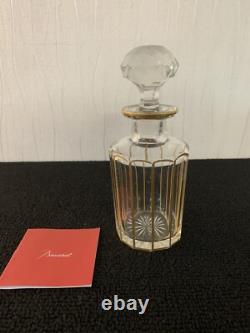 Flacon doré en cristal de Baccarat ou Saint Louis h 17 cm