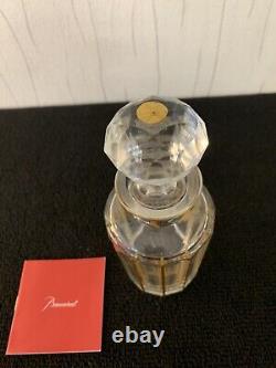 Flacon doré en cristal de Baccarat ou Saint Louis h 17 cm