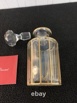 Flacon doré en cristal de Baccarat ou Saint Louis h 17 cm