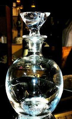 Saint-Louis. Carafe à vin de forme ovoïde, en cristal clair. Modèle Isis